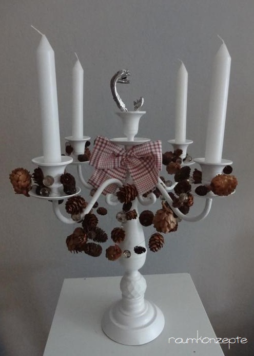 Kerzenleuchter weihnachtlich mit Kranz Geweih Schleife und Zapfenkette